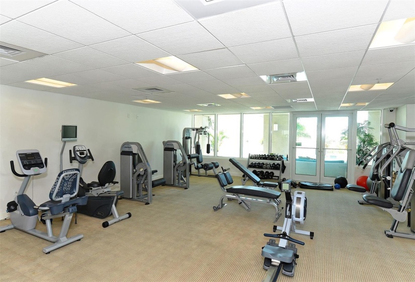 spacious fitness room with state of the art equipment