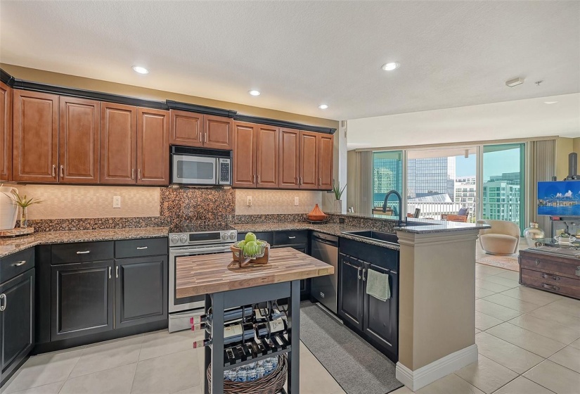 gourmet kitchen with lots of cabinets and pantry