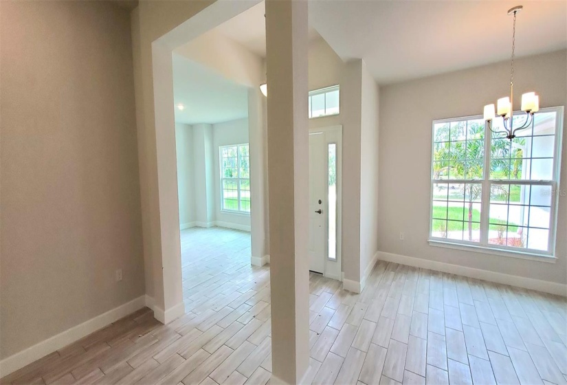 Foyer w/ flex room and dining room