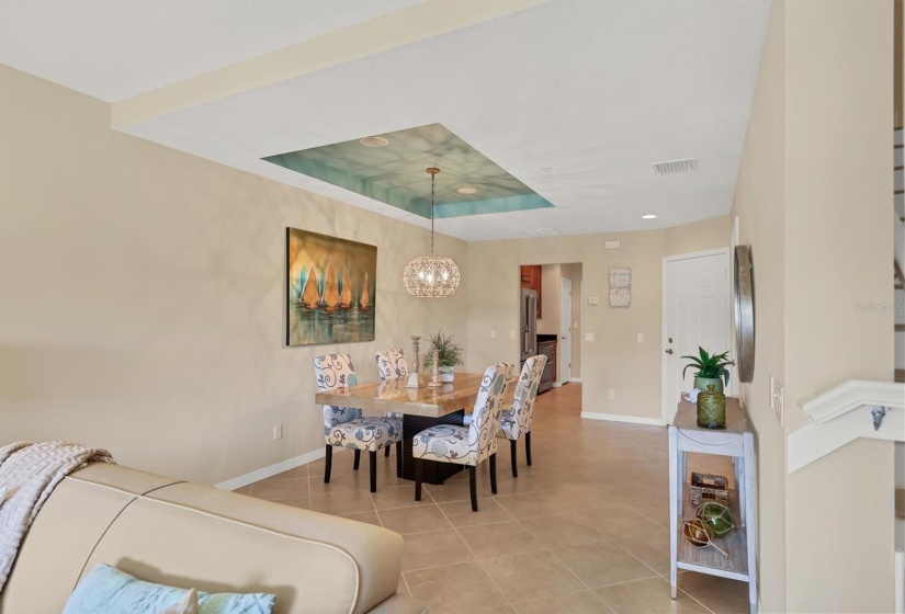 Spacious dining area with step ceiling detail