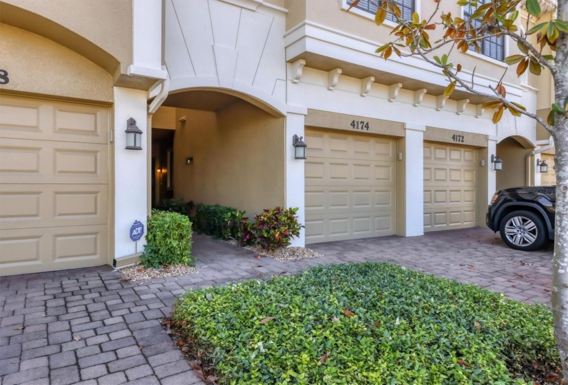 One car garage and paver driveway