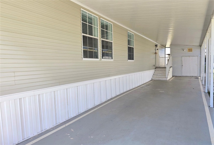 Carport can fit up to 3 cars or you can easily screen in and make a large outside  covered patio