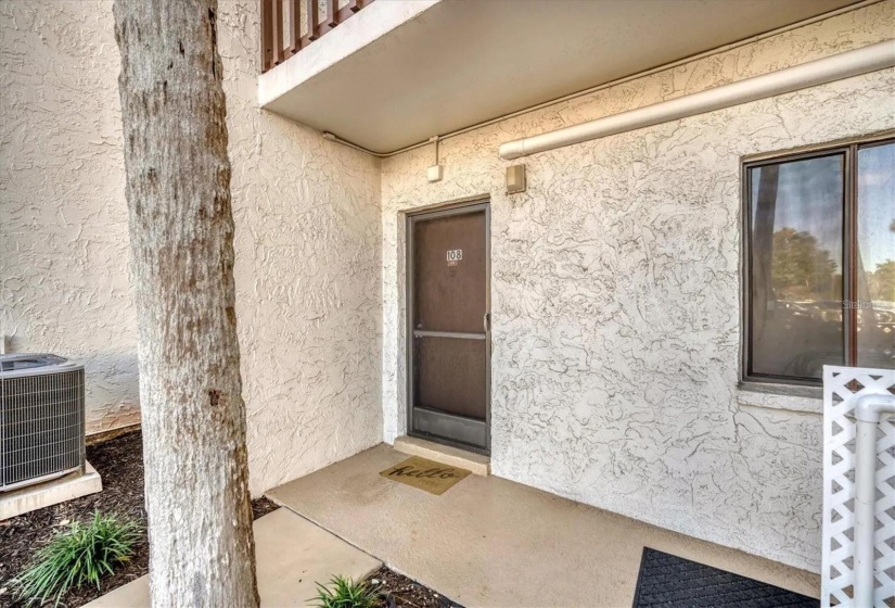 Front door is covered so you stay dry durring a shower.