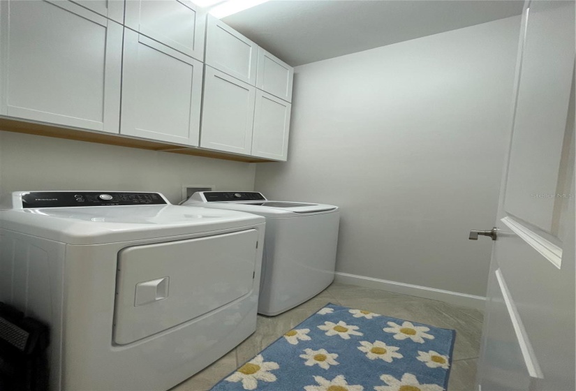 Laundry room at front of home by garage