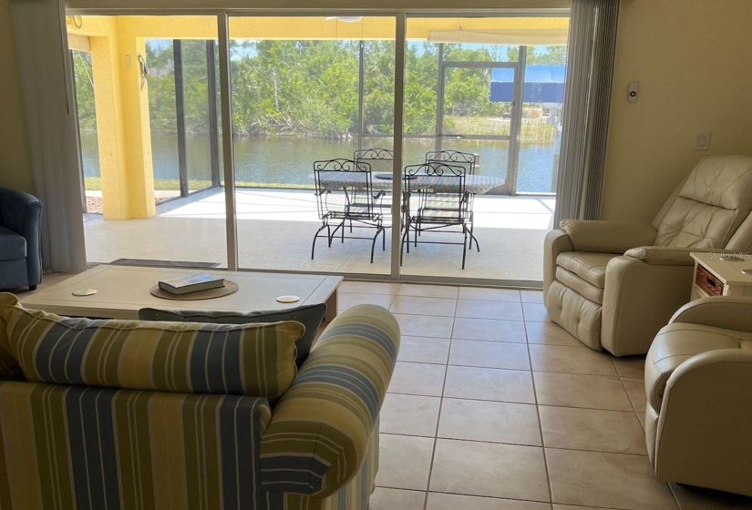 Livingroom with view of lanai and canal