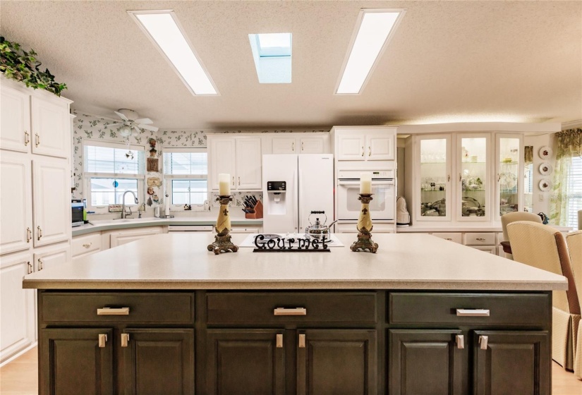 Beautiful kitchen, cooktop in island. And look at all the storage.