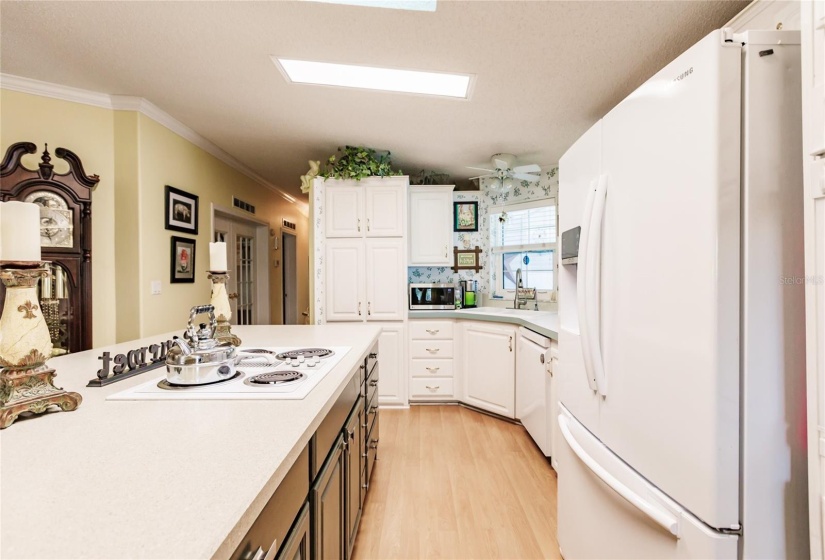 Major storage in the Kitchen. Cooktop in the island.