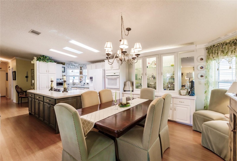 Beautiful large dinning room to entertain your guests. Look at that amazing china hutch with plenty of room for your crystal.