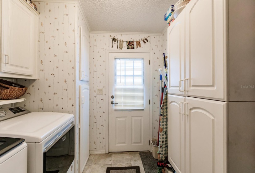 Amazing large washer and dryer in this huge laundry room with plenty of storage. With 3rd entry door to this Outstanding home. Its a must see.