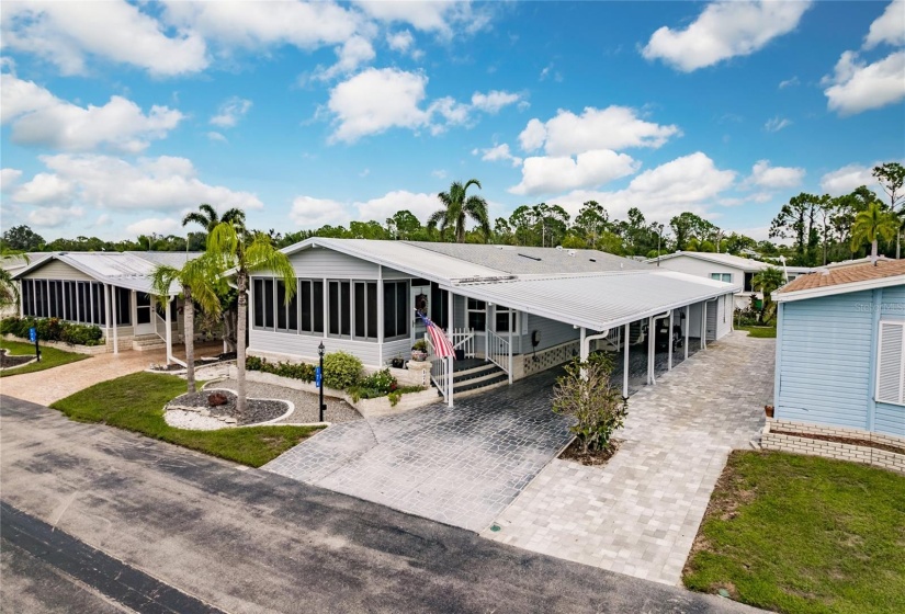 Aerial view of the new roof. On this Amazing home. Plenty of storage throughout. Did i mention 3 car carport with beautiful pavers.