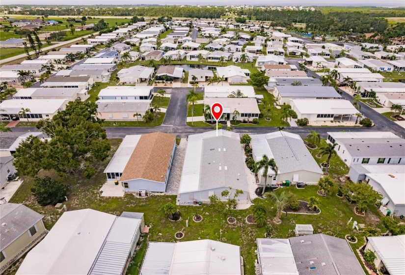 Aerial view of this fabulous active lifestyle community of Burnt Store Colony. Come see the fun activities, amazing screened and heated pool, spa, banquet hall, club house and the Woodpecker's building. There is tennis, pickle ball, shuffleboard, exercise room, library, pool tables, ping pong. So many more activities and fun. Come check it out.