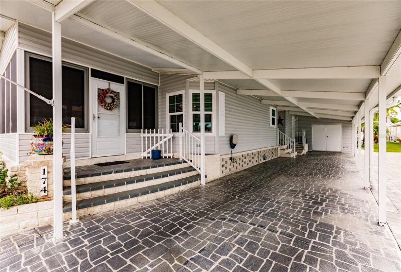 Front door into lanai and carport