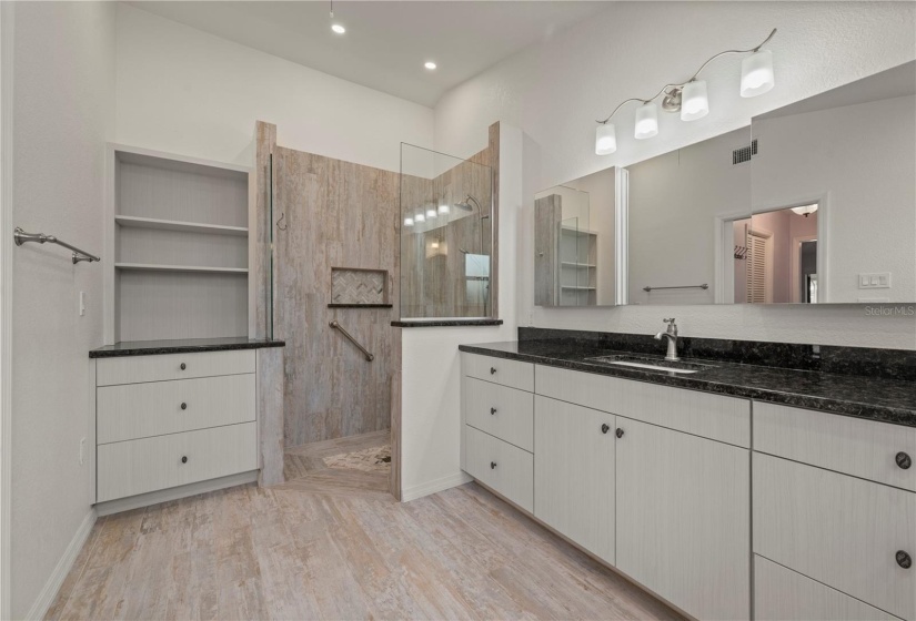 Professionally Renovated Master Bathroom with tile flooring