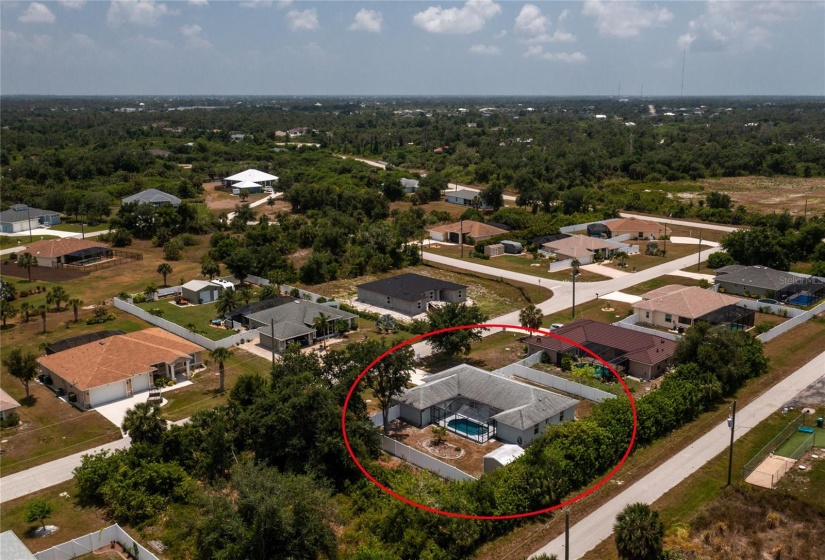 Aerial view of pool side of the home