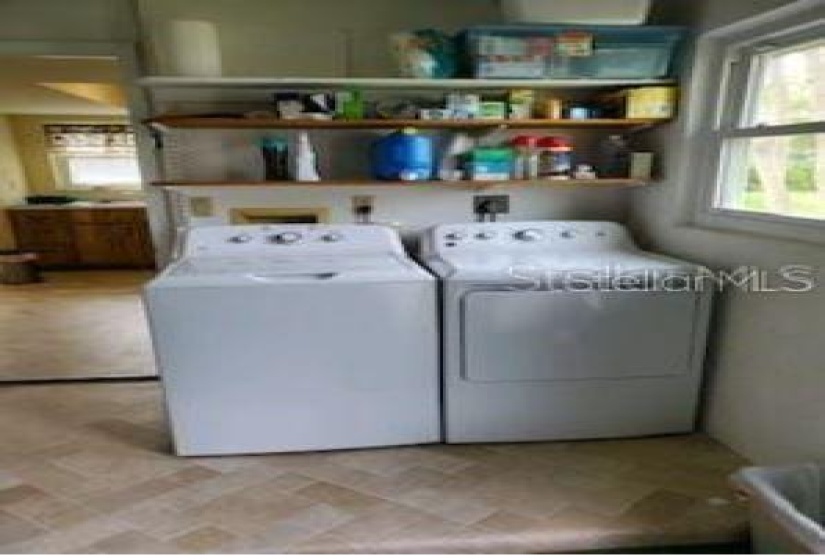 Washer & Dryer Located In Garage