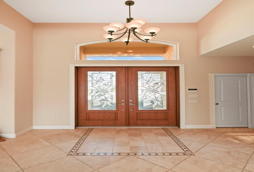 Greet guests through a beautiful double-door entry.  Doors are new and storm rated.