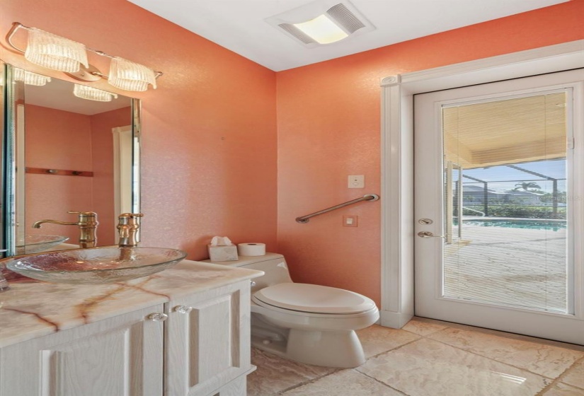 Pool bath with white onyx back-lit vanity