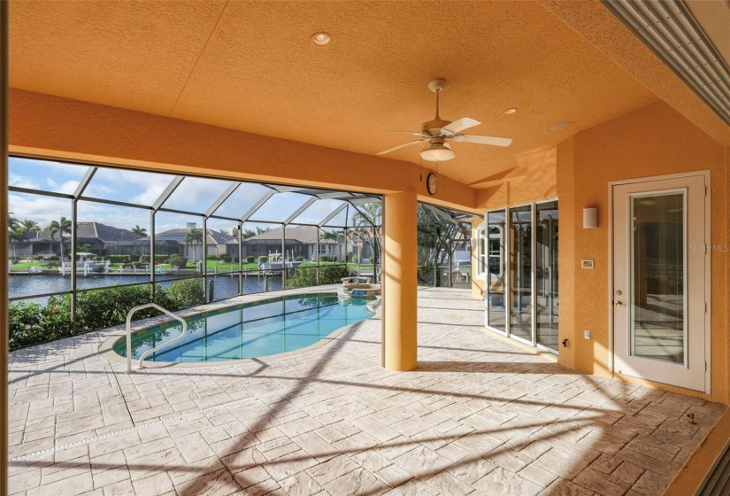 Spacious lanai with roll-down storm screen across the lanai