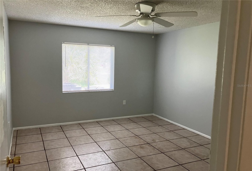 Master bedroom looking at the backyard