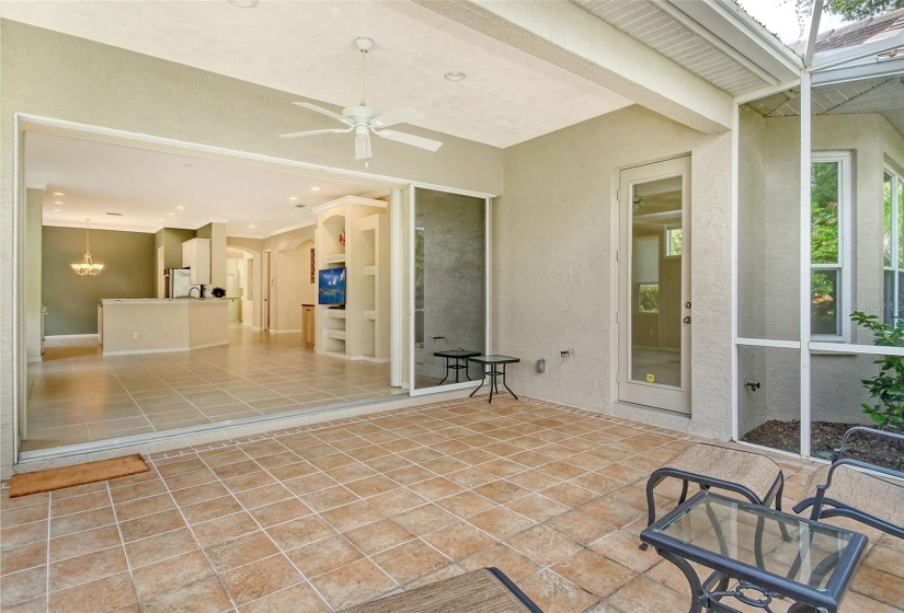 View into the house from the lanai. Access to primary bedroom from Lanai