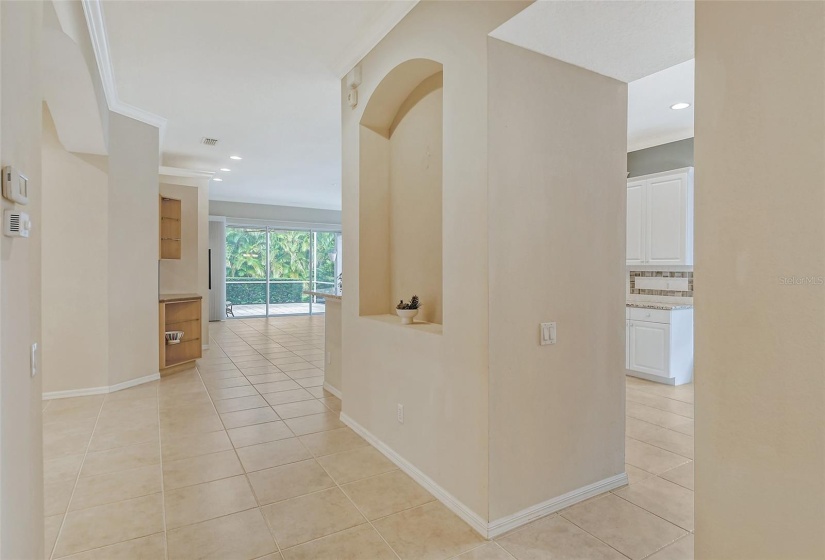 Hallway to kitchen, dining room and living room