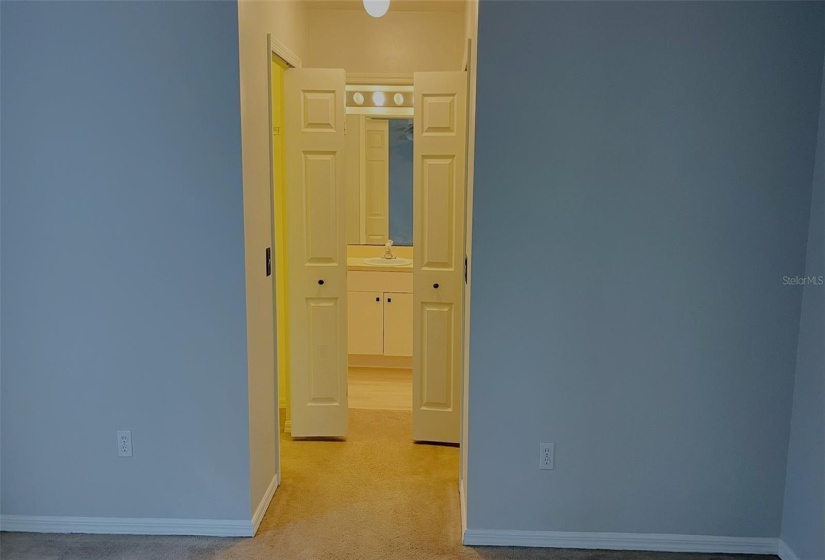 Dual Walk-in Closets Master Bedroom to Bath