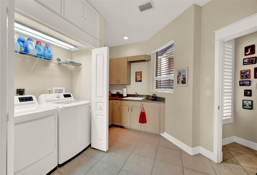 and a sink with some cabinets