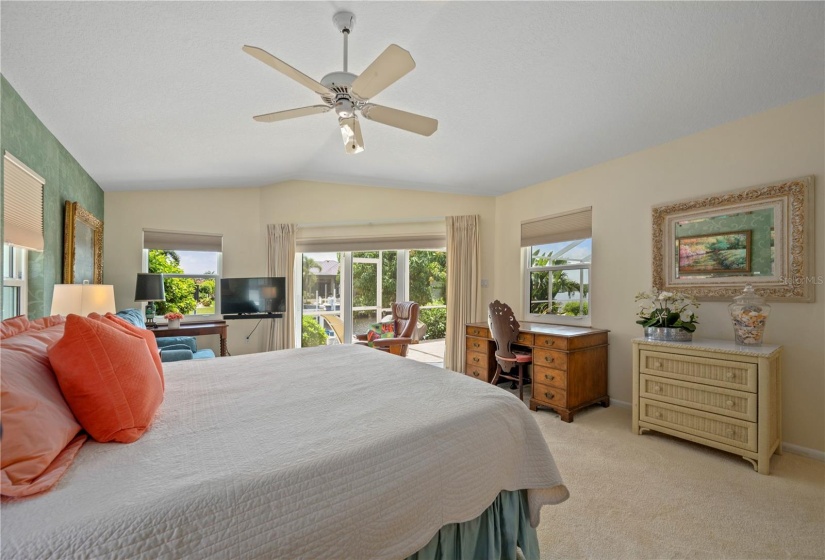 Primary Master Suite 2, so much room it doubles as office - desk with a view of pool and Sunset Lake