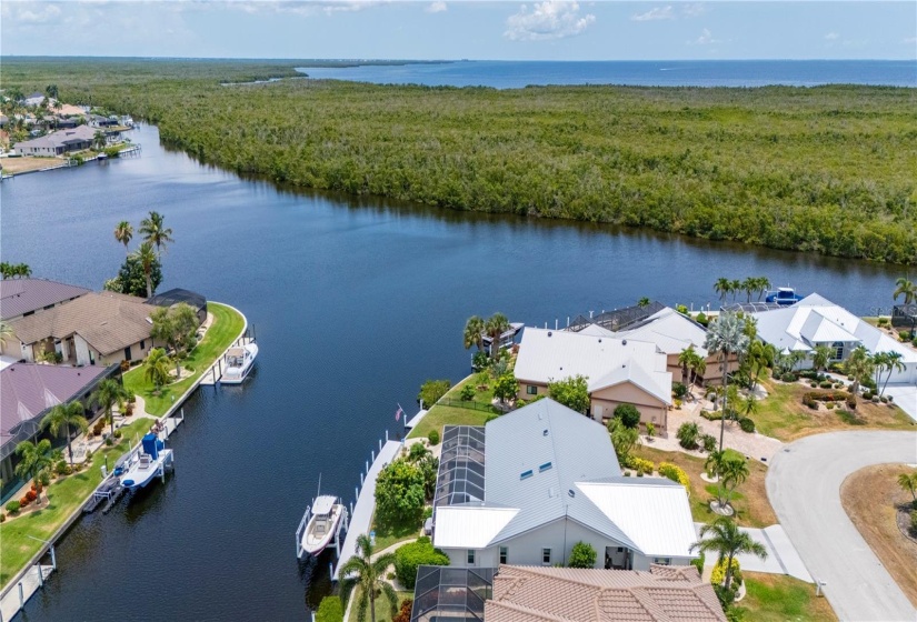 Aerial looking SE. Charlotte Harbor's open water on the other side of Mangrove Preserve.