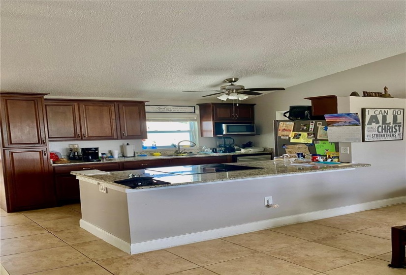 Fully Equipped Stainless Kitchen Appliances with Plenty of Cabinet Space Plus Pantry