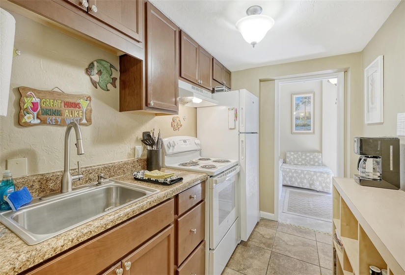 Kitchen in mother-in-law suite with view of den