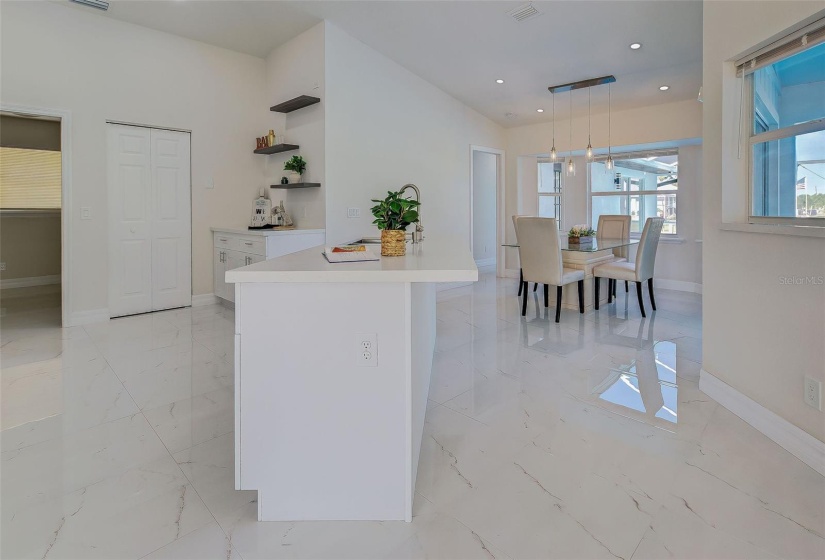 Kitchen island sink.  Open to dining and living room.