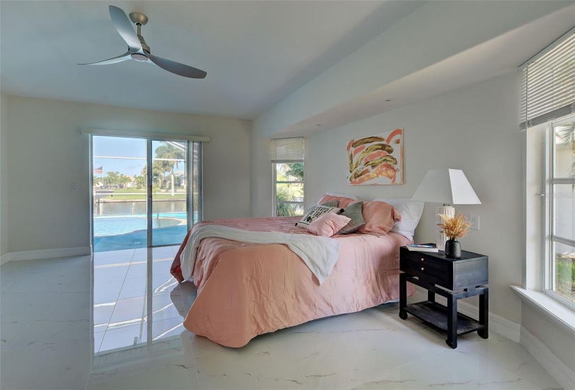 Master Bedroom Sliders to the pool.  Great water view to wake up to.