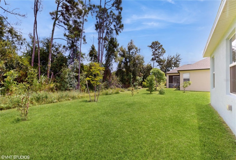 SIDE REAR VIEW OF HOME