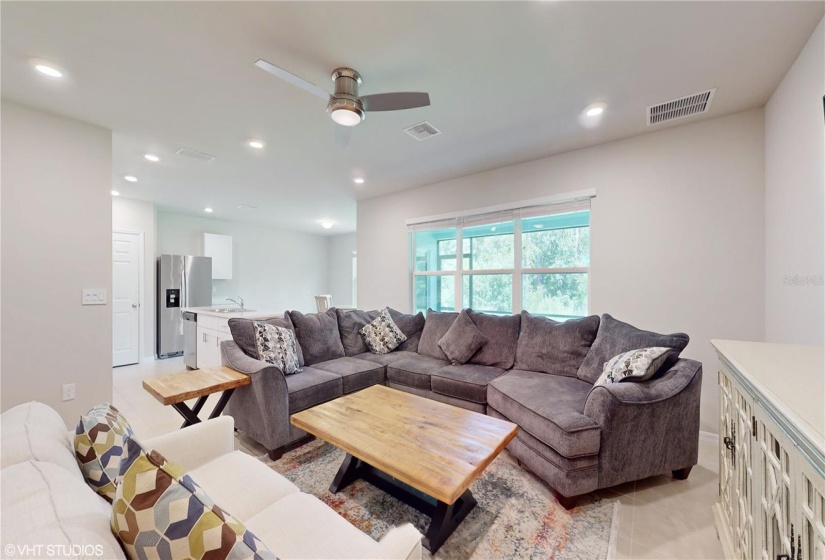 GREAT ROOM. WHOLE MAIN BODY OF THE HOUSE IS WRAPPED IN TILE.