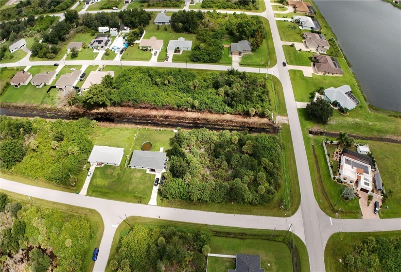 Aerial view of two lots, side by side.  Two parcels being sold together.