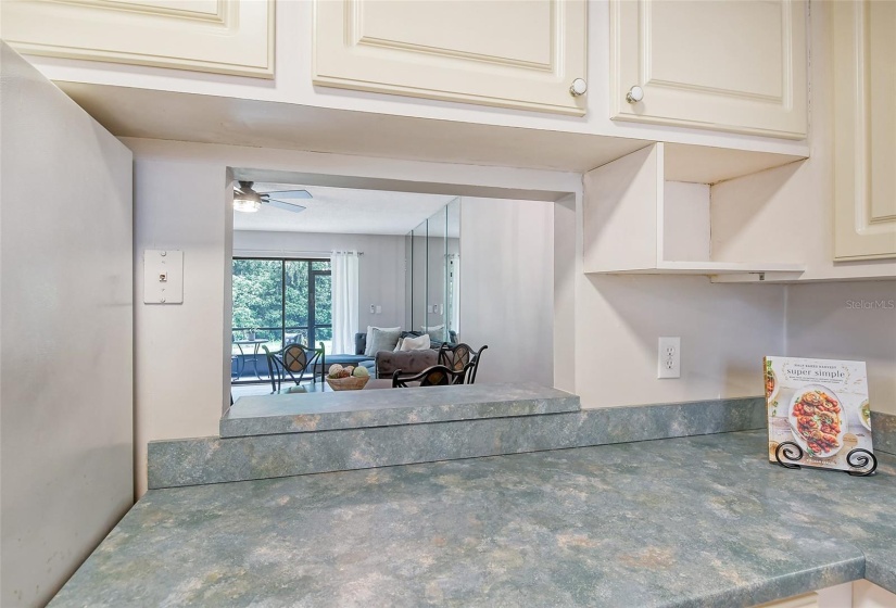 View from kitchen into the living & dining areas.