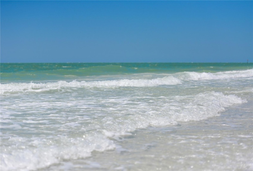 The soothing waves and white quartz sand of Siesta Beach.