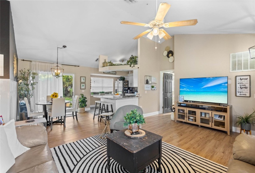 LOIVING ROOM, DINING ROOM OVERLOOKING KITCHEN