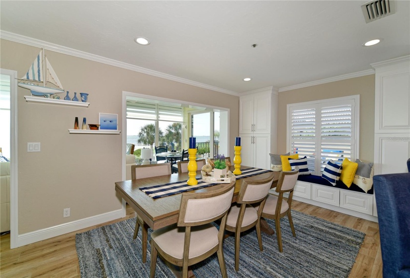 Dining area just off the screened terrace (Renovated Example)