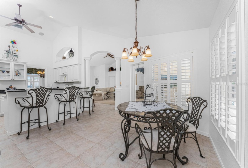 Dinette area and large breakfast bar provide dining choices, whether it's for morning coffee or casual lunch.