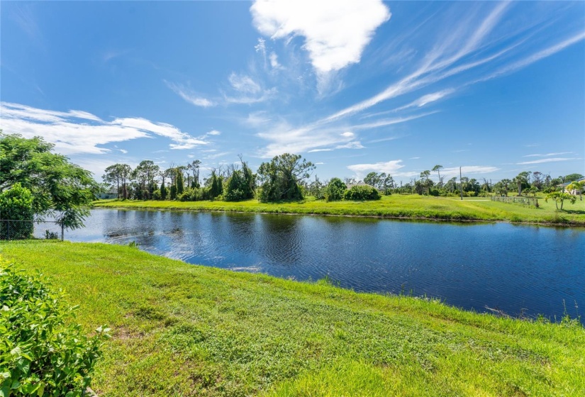 Fresh water canal provides a beautiful water view, plus provides privacy and source of water for the irrigation system.