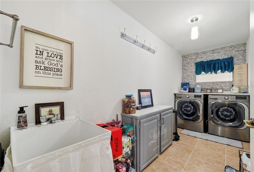 Inside large utility room w/ sink