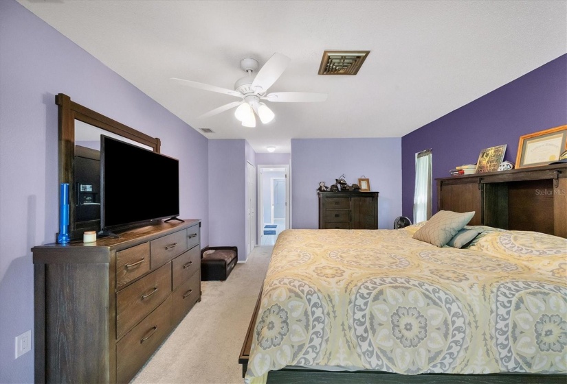 Primary bedroom with ensuite closets and bathroom