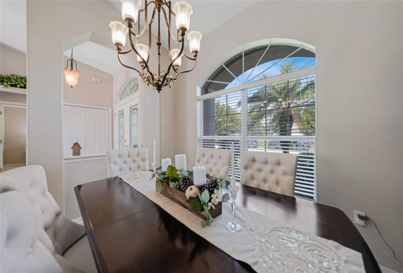 Dining area with front door seen in picture