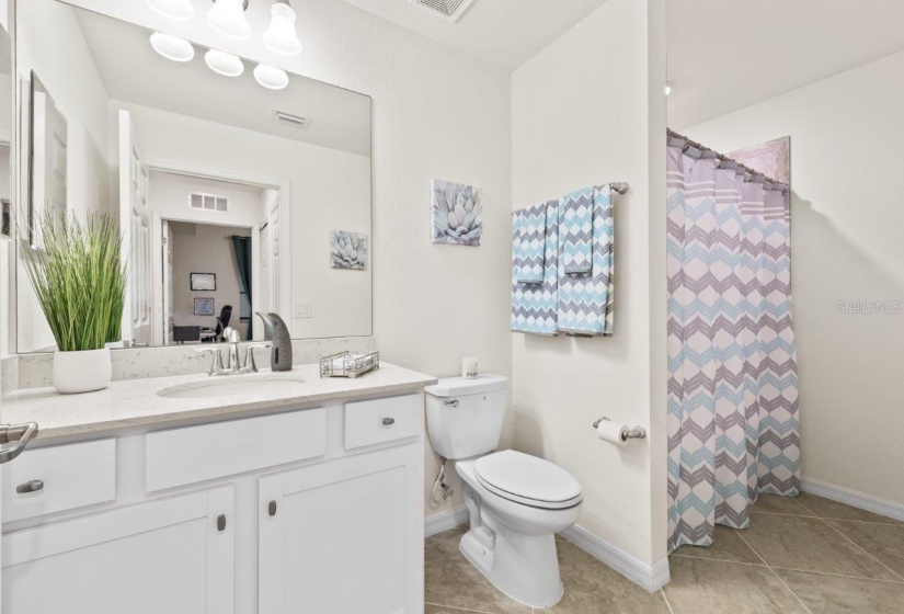 Guest bathroom #2 and Laundry Closet.