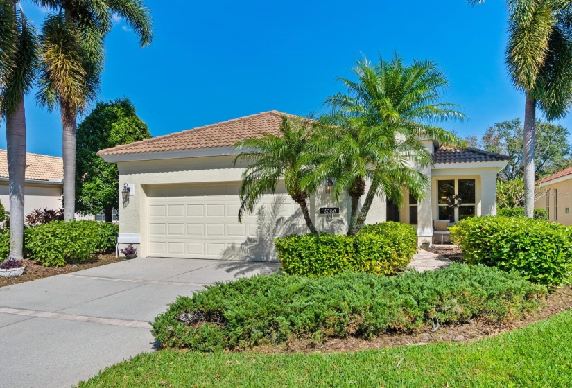 Tile roof, and tropical landscaping.