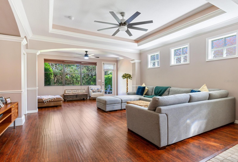 Spacious great room featuring volume ceilings