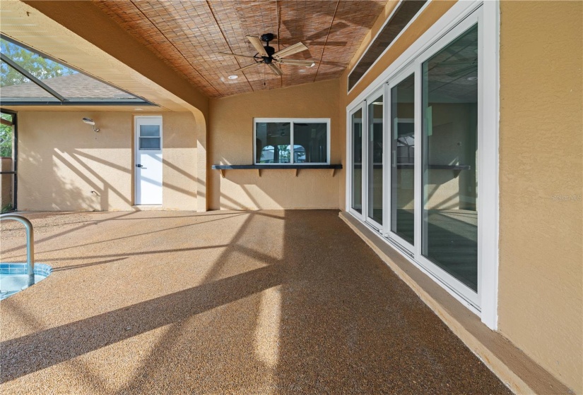 Enjoy the shaded part of your screened pool deck