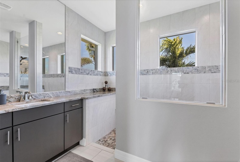 Modern Ensuite Featuring Dual Vanities